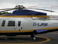 G-LJRM @ EGLK - ONE OF FIVE S.76 IN THE PREMIAR COMPOUND OF THREE VARIANTS SEEN THIS DAY - by BIKE PILOT
