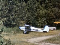 N1805B @ NY94 - This Luscombe was parked amongst the trees at Old Rhinebeck at a summer airshow in 1975. - by Peter Nicholson