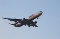 N615FE @ LFPG - on landing at CDG - by juju777