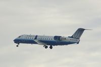 N592ML @ CID - Landing gear coming up.  On the way to O'Hare International - by Glenn E. Chatfield