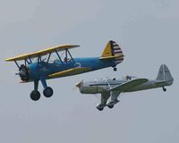 N49986 @ 3VA3 - In formation with a Ryan PT-22 - by Unknown