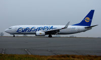 5B-DBU @ EGGW - Eurocypria Boeing 737 lands at Luton on a grey December Day - by Terry Fletcher