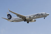 N556AS @ KLAX - Landing 24R at LAX - by Todd Royer