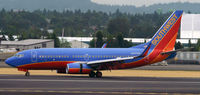 N427WN @ KPDX - Landing 10R at PDX - by Todd Royer
