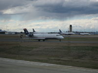 N209PS - Papa Sierra in line with a lot of her sister aircraft on a windy day at CLT. - by Skogkledde