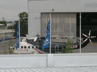 C-FCLM @ YMEN - C-FCLM in front of Cirrus hanger, Ess. Airport. (Taken from roof of Essendon Chrylser dealership across the road.) - by Mat Jager