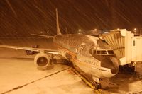N951AA @ KBDL - The Astrojet, operating our flight AA1653 BDL-MIA, sits at gate B5 in a brief snow squall.