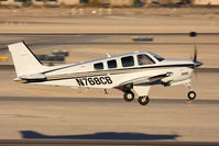 N768CB @ VGT - Timebuilders LLC Beechcraft A36 Bonanza N768CB departing RWY 12R enroute to Hesperia (L26). - by Dean Heald