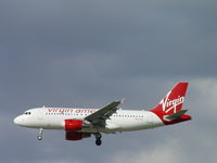 N525VA @ ONT - Virgin & Tonic over outer fence at Ontario - by Helicopterfriend