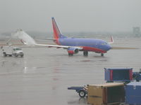 N901WN @ IND - Getting de-iced after install of internet antenna - by David Belser