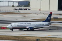 N409US @ KFLL - Boeing 737-400 - by Mark Pasqualino