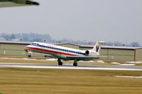 N627AE @ CID - Touching down on runway 13.  Hazy, and a wee bit blurred shot - by Glenn E. Chatfield
