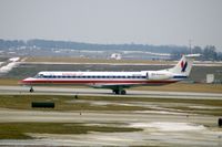 N627AE @ CID - Turning east off runway 13 onto runway 9 - by Glenn E. Chatfield