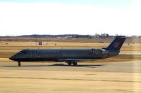 N948SW @ CID - Taxiing to the terminal - by Glenn E. Chatfield