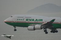 B-16409 @ VHHH - EVA Air approaching 25R - by Michel Teiten ( www.mablehome.com )