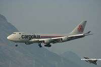 LX-FCV @ VHHH - Cargolux approaching 25R - by Michel Teiten ( www.mablehome.com )