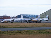 G-SOEI @ EGNH - with four other ex Emerald Airways 748's - by chris hall