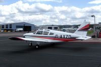 G-AXZD @ EGBJ - Former College of Air Training Piper PA-28 Cherokee 180E G-AXZD visiting Gloucester / Staverton from its home base at High Cross in Hertfordshire 14.06.08 - by GeoffW