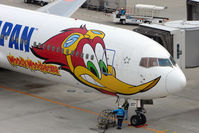 JA8357 @ RJTT - Say hi to Woody Woodpecker on this ANA B767 logojet - by Terry Fletcher