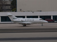 N819LX @ KSMO - N819LX taxiing - by Torsten Hoff