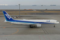 JA8257 @ RJTT - ANA B767 arrives Haneda - by Terry Fletcher
