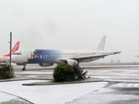 N586NK @ EGGW - In the Snow at Luton - by Andy Parsons