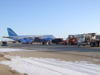 UR-82007 @ IAG - Part of the cargo to be loaded; Several more trucks pulled in as I was leaving - by Jim Uber