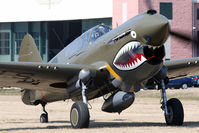 N1941P @ 42VA - 1941 Curtiss Wright P-40E Kittyhawk N1941P taxiing up the runway prior to the flight demonstration today. - by Dean Heald