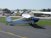 N3039E @ SZP - 1946 Aeronca 7AC CHAMPION, Continental O-200 100 Hp upgrade by STC, taxi for another grass takeoff - by Doug Robertson