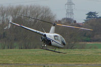 G-BYIE @ EGBJ - Robinson R22 Beta at Staverton - by Terry Fletcher