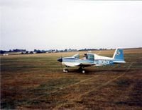 G-BDNX @ EGSG - Grumman AA1B Trainer G-BDNX taxies out at Stapleford to compete in the round London air race 1st September 1984 - by GeoffW