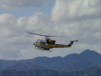 N14LA @ POC - Stopping, hovering, preparing to turn left (south) into EHA helipad - by Helicopterfriend