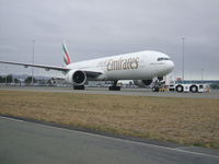 A6-EBJ @ NZCH - Just pushing back on the first ever Emirates 777-300ER to Christchurch - by William Read