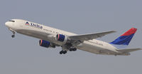 N126DL @ KLAX - Departing LAX on 25R - by Todd Royer