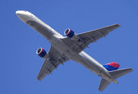 N669DN @ KSNA - Delta B757 taking off on & looking heavy - by Mike Khansa