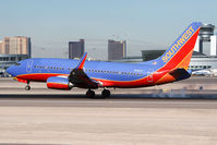 N421LV @ LAS - Southwest Airlines N421LV (FLT SWA535) from Indianapolis Int'l (KIND) landing on RWY 25L. - by Dean Heald