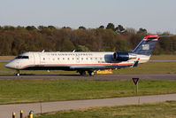 N444ZW @ ORF - US Airways Express (Air Wisconsin) N444ZW (FLT AWI4042) taxiing to RWY 23 for departure to Philadelphia Int'l (KPHL). - by Dean Heald