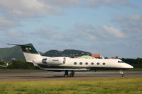 N818ME @ TNCM - taxing runway 09 - by daniel jef