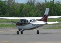 N210SF @ DTN - Taxiing to runway 32 at the Shreveport Downtown airport. - by paulp
