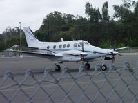 N69301 @ POC - Parked behind the fence at Brackett - by Helicopterfriend