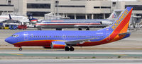 N304SW @ KLAX - Taxi to gate - by Todd Royer