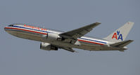 N319AA @ KLAX - Departing LAX on 25R - by Todd Royer