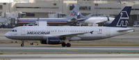 N415MX @ KLAX - Taxi to gate - by Todd Royer