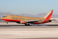N350SW @ LAS - Southwest Airlines N350SW (FLT SWA143) from Reno/Tahoe Int'l (KRNO) landing on RWY 25L. - by Dean Heald