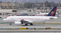 N499TA @ KLAX - Taxi to gate - by Todd Royer