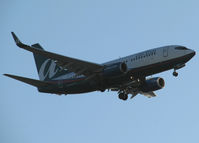 N168AT @ KSRQ - AirTran 737-700WL in to SRQ - by Joel Cox