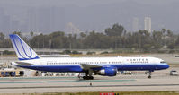 N596UA @ KLAX - Taxi to gate - by Todd Royer
