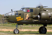 N7947C @ 42VA - Ray Fowler at the controls of the beautifully restored 1944 North American B-25J Wild Cargo going through pre-flight checks before a flight demonstration. - by Dean Heald