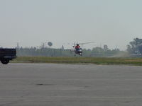 6590 @ POC - USCG Dolphin HH 65C almost touching down and sweeping runway 26R - by Helicopterfriend