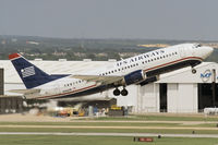 N166AW @ KSAT - US Airways B737-33A leaves KSAT - by FBE